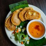 Images of food and decor in a Thai restaurant